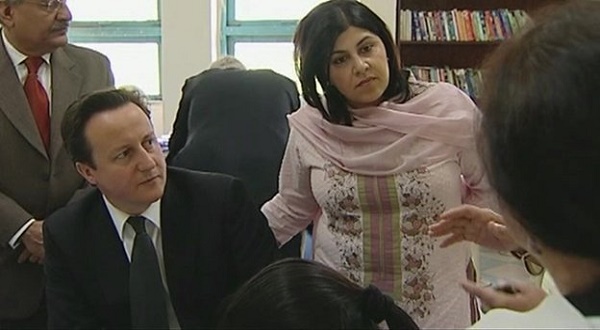 Baroness Sayeeda Warsi, Foreign Office Minister, with Prime Minister David Cameron of Britain. She resigned protesting the British government’s silence on Israel’s war on Gaza.